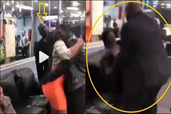 A Man Receive Beatings for Over Hugging Another Persons Wife - Watch Video